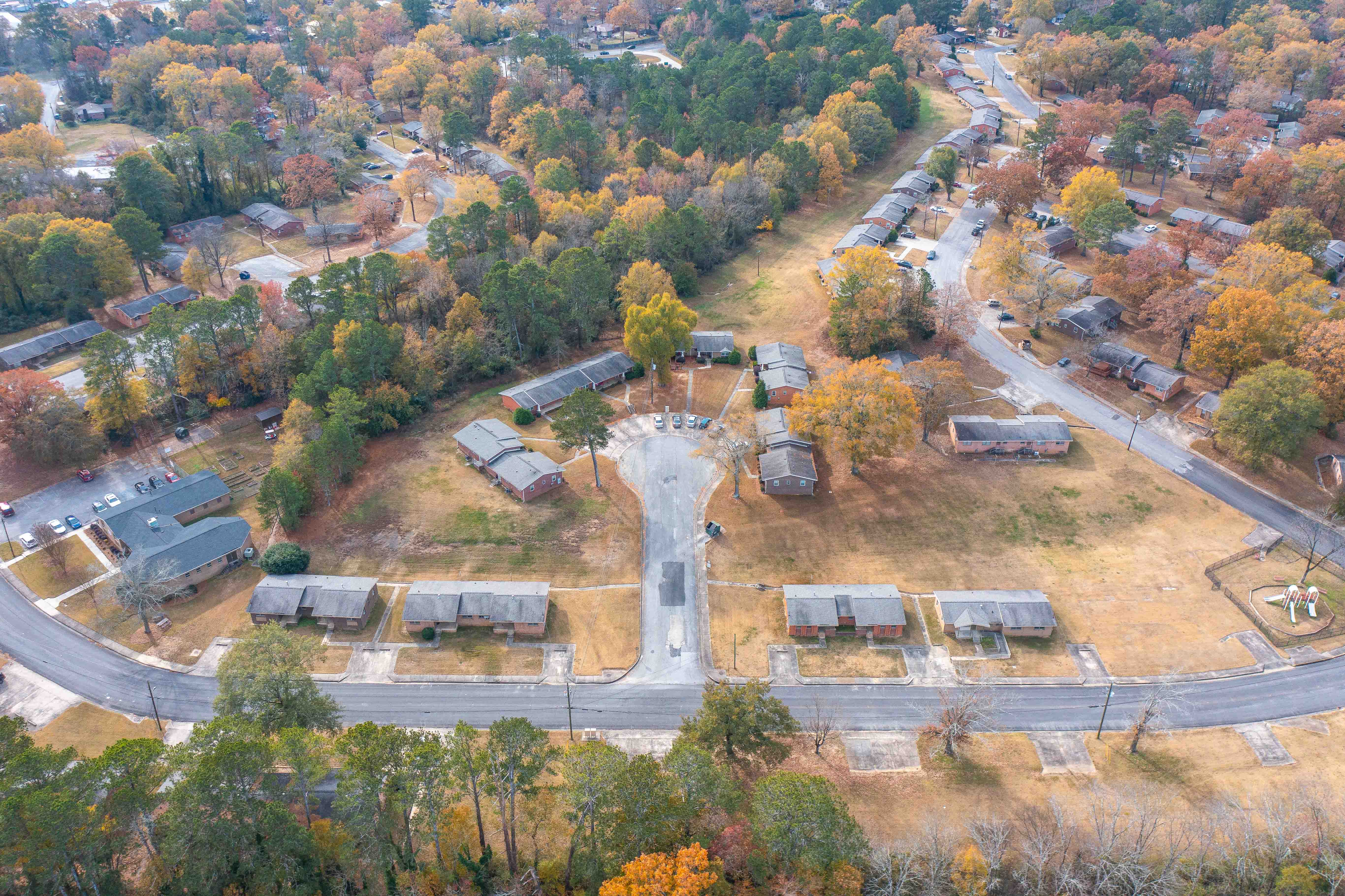 A small town with a lot of trees and houses.